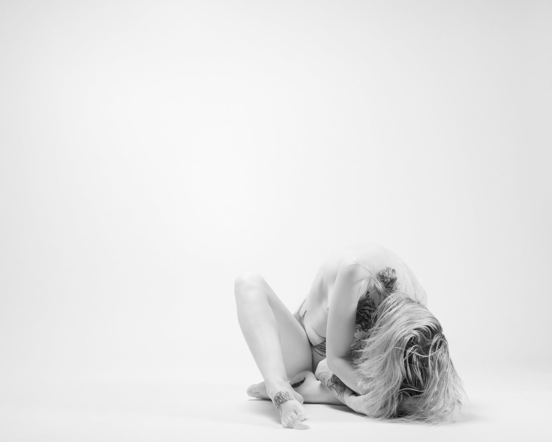 Hide — black and white figure study, Porcelain series, fine art photography print by Kofi Amoa