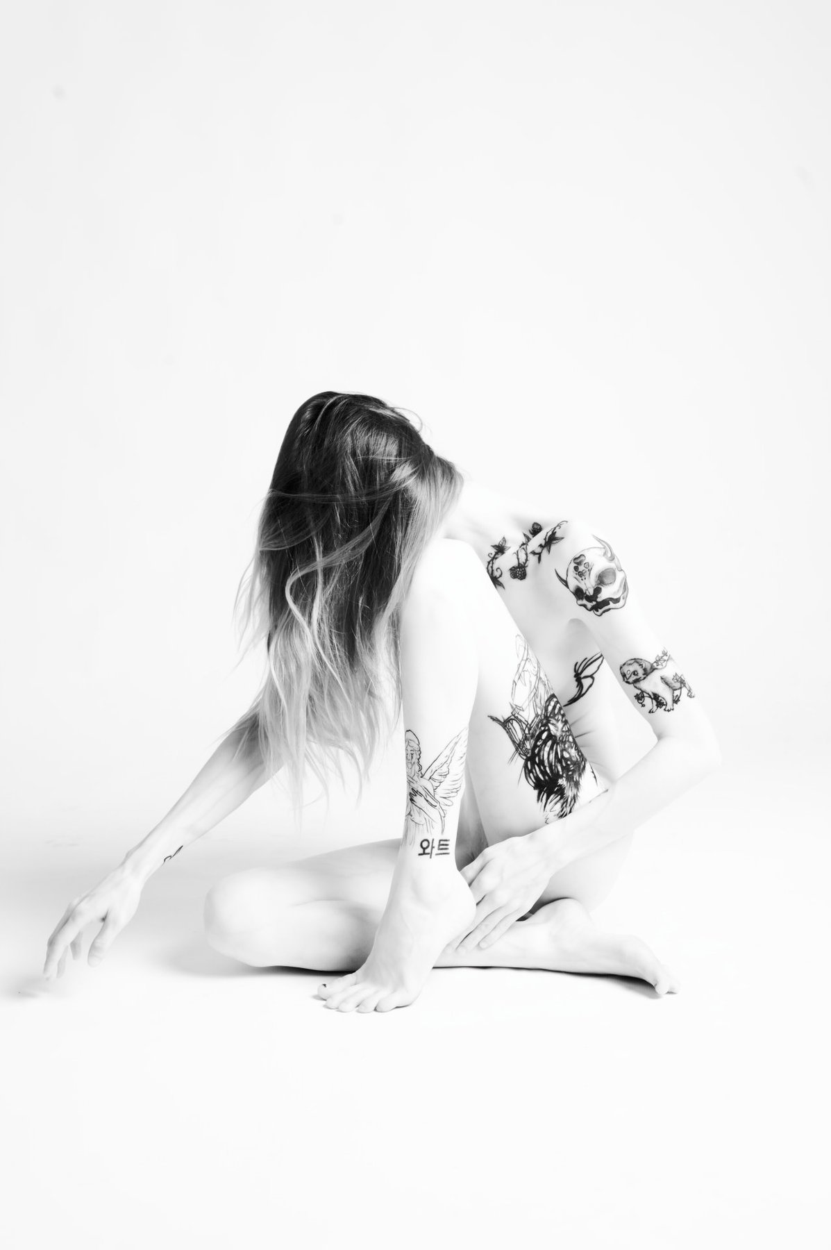 Reach — black and white figure study, Porcelain series, fine art photography print by Kofi Amoa